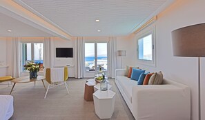 Delos Premium Suite with Outdoor Jetted Tub and Private Pool | Living room | 45-inch flat-screen TV with satellite channels, TV - Myconian Korali (Mykonos)