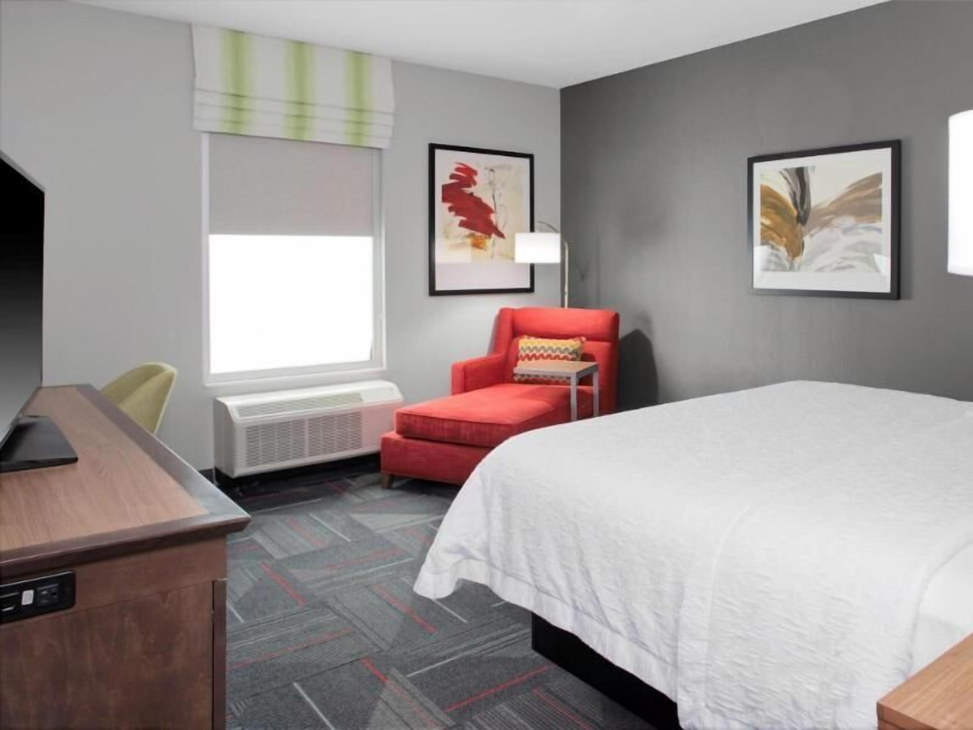 Desk, laptop workspace, blackout drapes, iron/ironing board