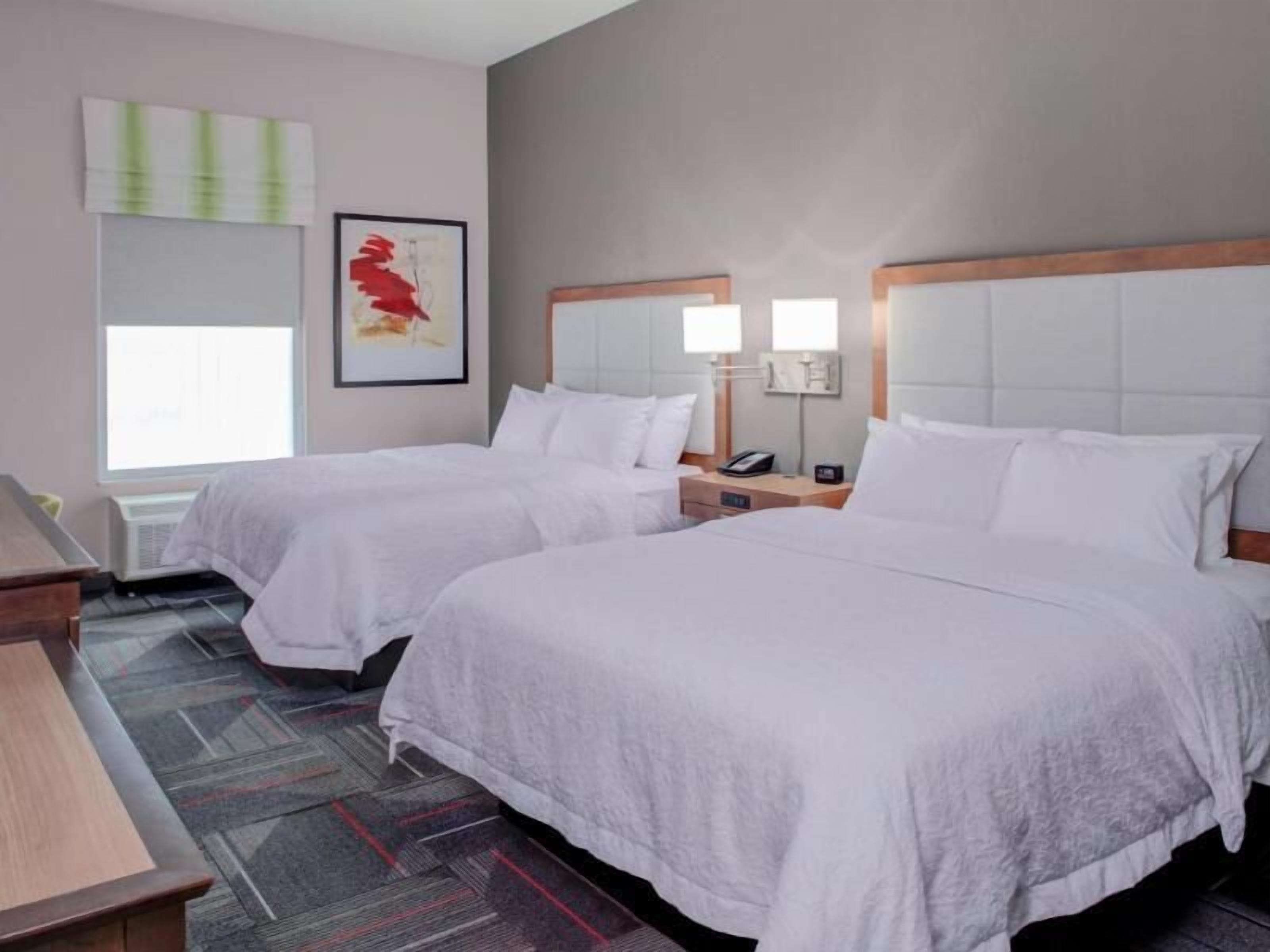 Desk, laptop workspace, blackout drapes, iron/ironing board