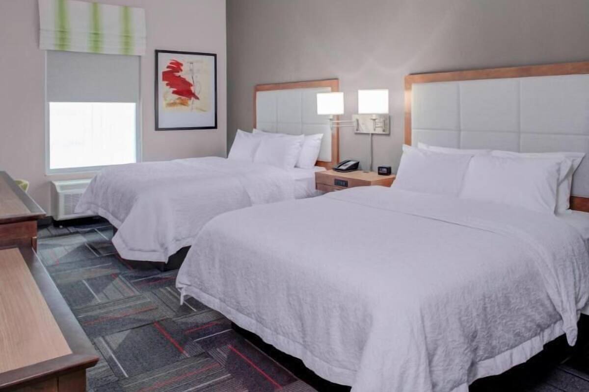 Desk, laptop workspace, blackout drapes, iron/ironing board