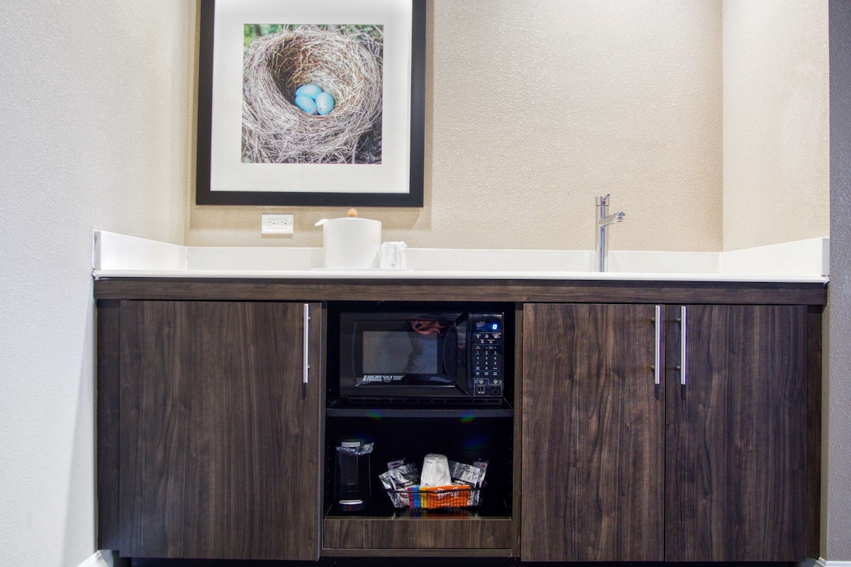 desk, laptop workspace, blackout curtains, iron/ironing board