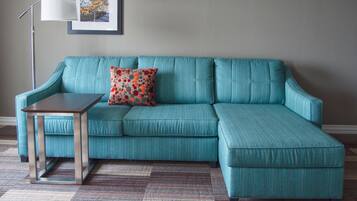 Room, 1 King Bed, Smoking, Refrigerator & Microwave (w/ wetbar) | Living area | 42-inch flat-screen TV with cable channels, TV