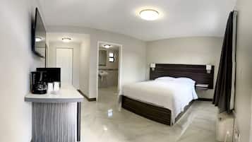 Deluxe Room | Blackout curtains, iron/ironing board, free WiFi, bed sheets