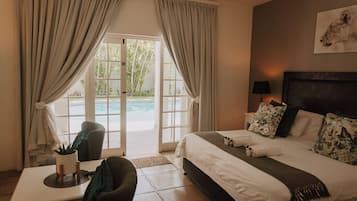 Deluxe Room, 1 Bedroom (King Bedroom - Ocean Breeze) | In-room safe, individually decorated, individually furnished