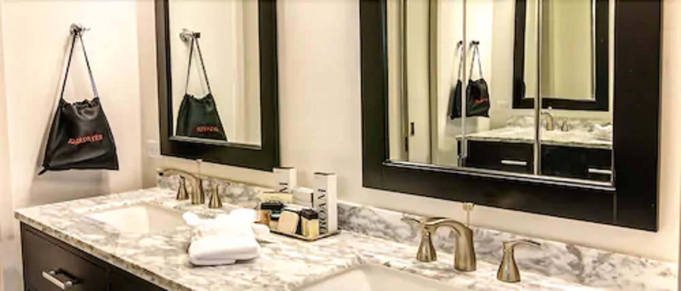 honeymoon suite, refrigerator & microwave | bathroom sink