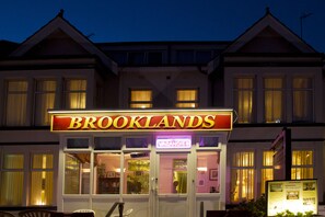 A hotel named "Brooklands" with a signboard, large windows, and a visible entrance. - Brooklands Over 50's Only (Blackpool)