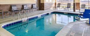 An indoor swimming pool with clear water, surrounded by lounge chairs and a tiled deck. - Fairfield Inn and Suites by Marriott Chillicothe (Chillicothe)