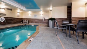 An indoor swimming pool with a lifeguard on duty sign, a no diving warning, and a no diving sign. - Fairfield Inn and Suites by Marriott Chillicothe (Chillicothe)