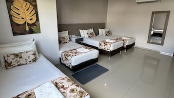 Triple Room | Minibar, desk, blackout drapes, free WiFi