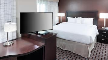 Premium bedding, desk, laptop workspace, iron/ironing board
