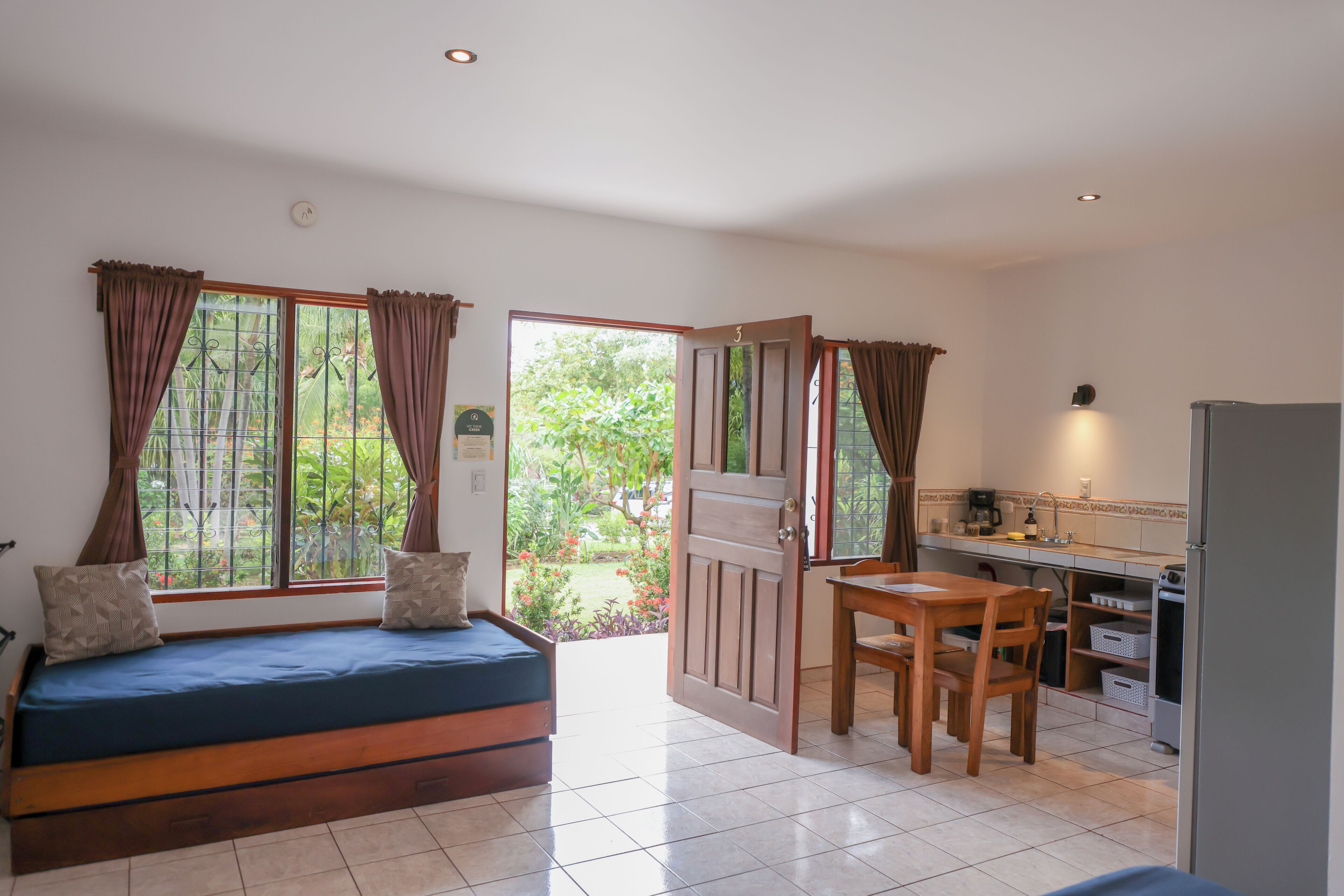 standard studio, kitchen, garden view | living area | 32-inch smart tv with digital channels, netflix, books