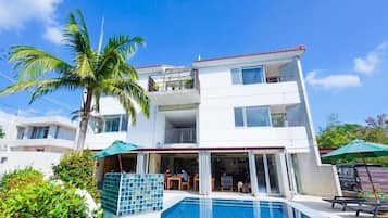 Outdoor pool, open 9:00 AM to 9:00 PM, pool umbrellas, pool loungers