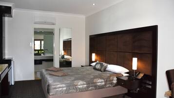 Executive Queen | Premium bedding, desk, soundproofing, iron/ironing board