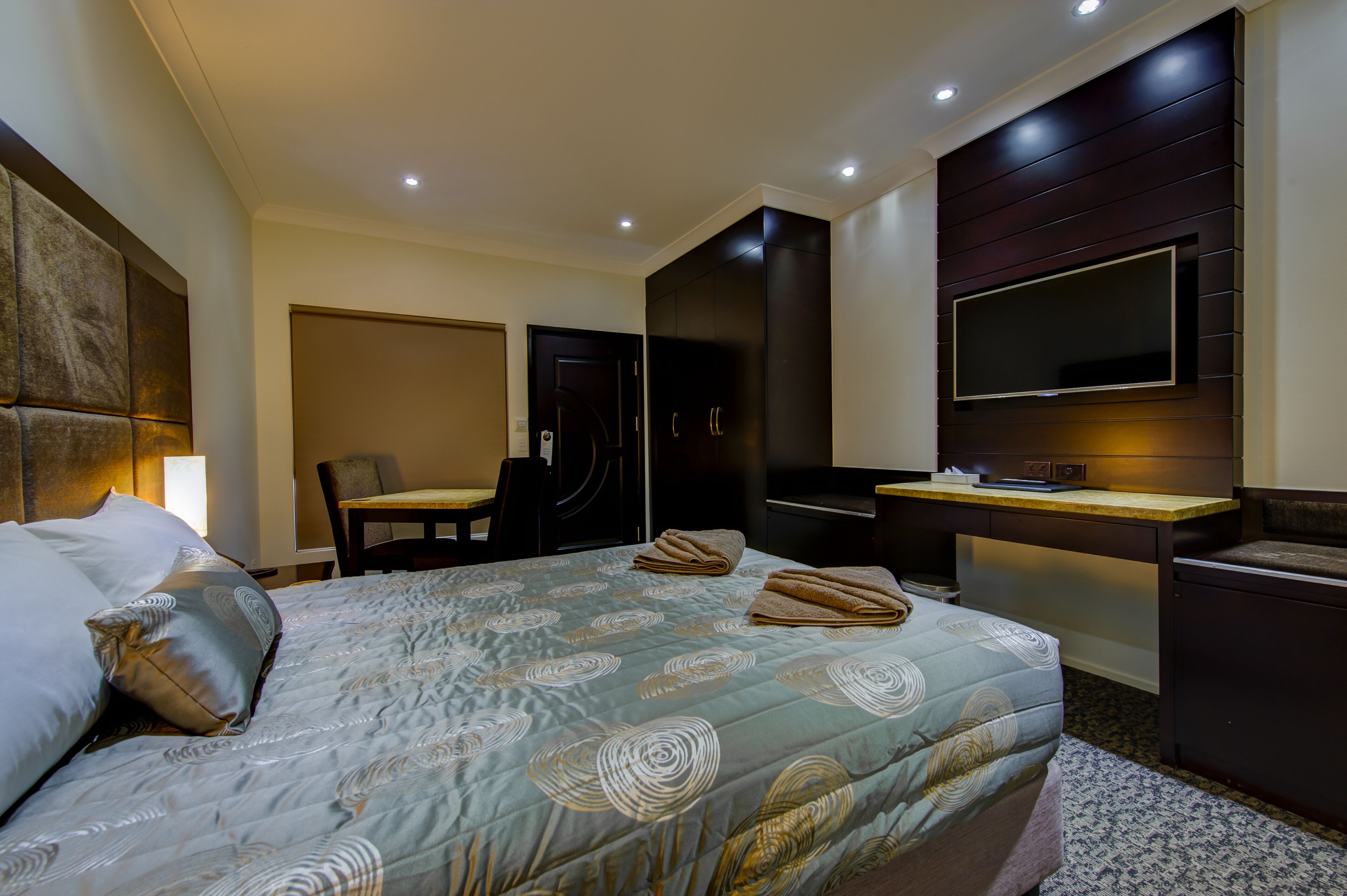 Executive Queen | Premium bedding, desk, soundproofing, iron/ironing board