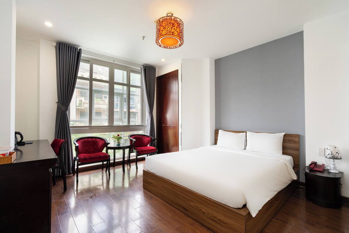 Deluxe Double Room, City View | Minibar, in-room safe, desk, blackout curtains