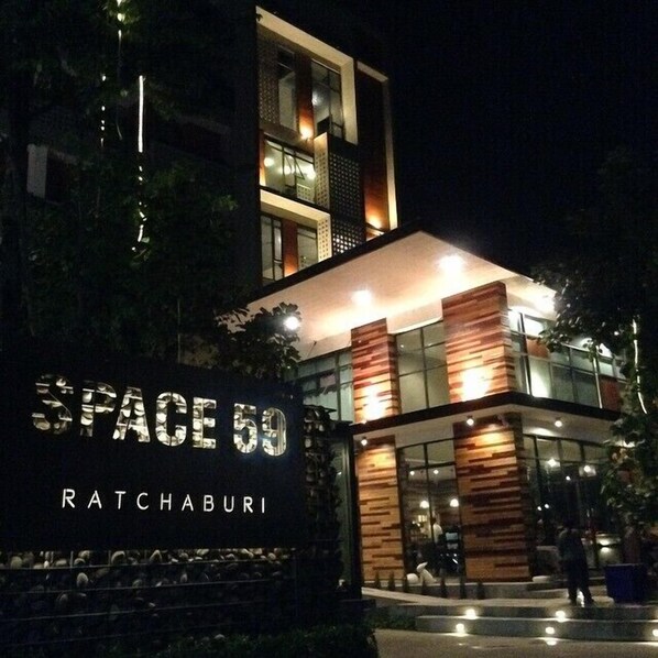 A modern building with a sign reading "SPACE 50 RATCHABURI".