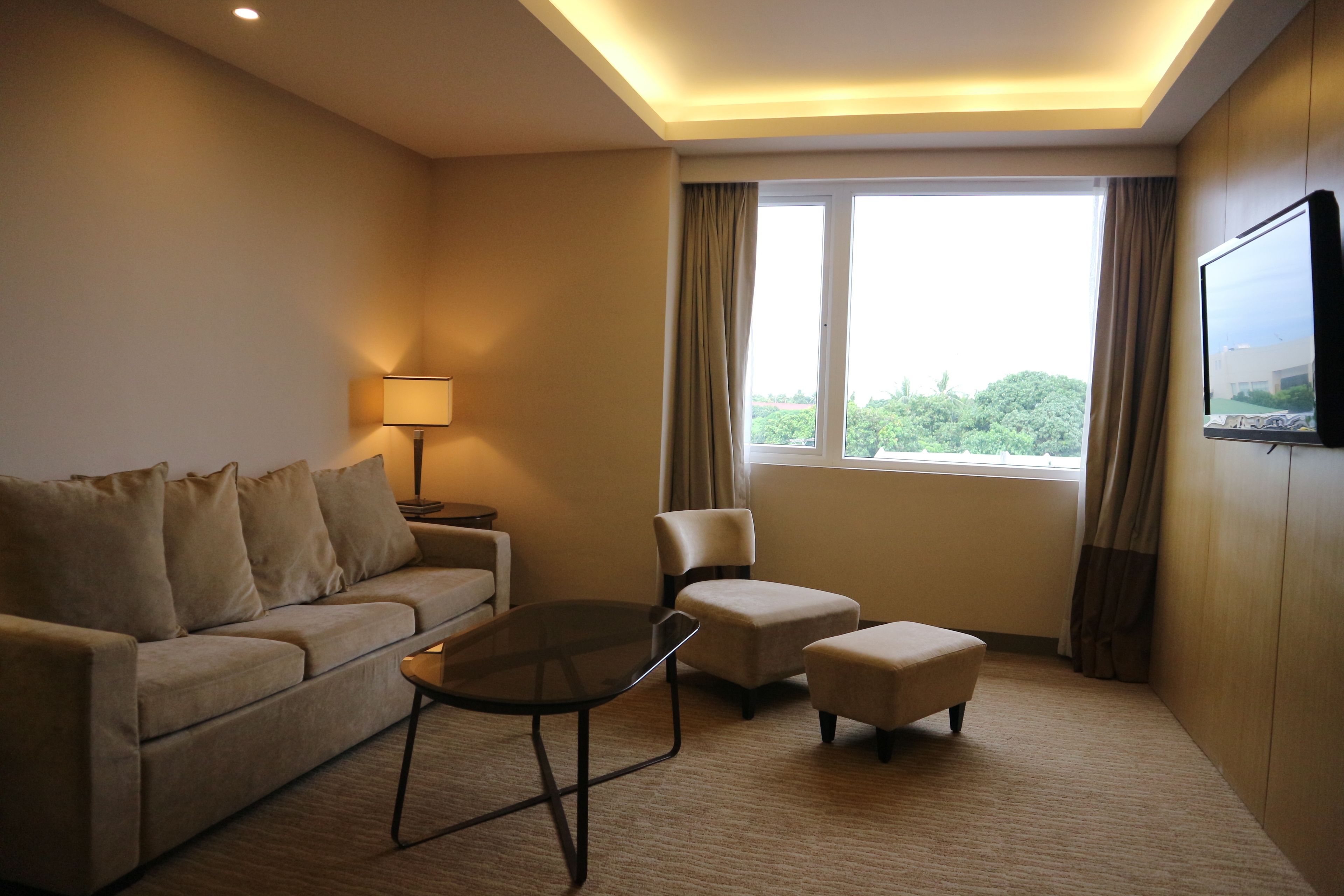 junior suite | living area | flat-screen tv