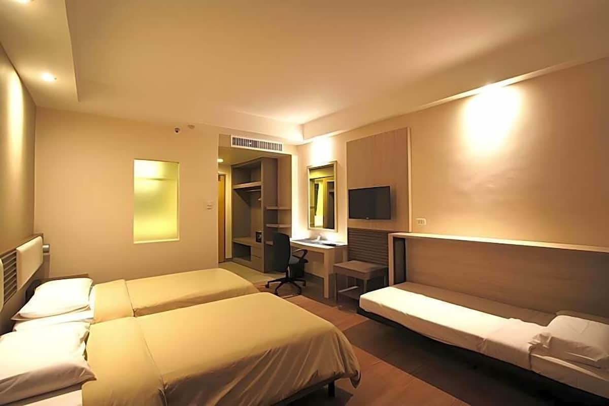 Luxe beddengoed, een kluis op de kamer, een bureau