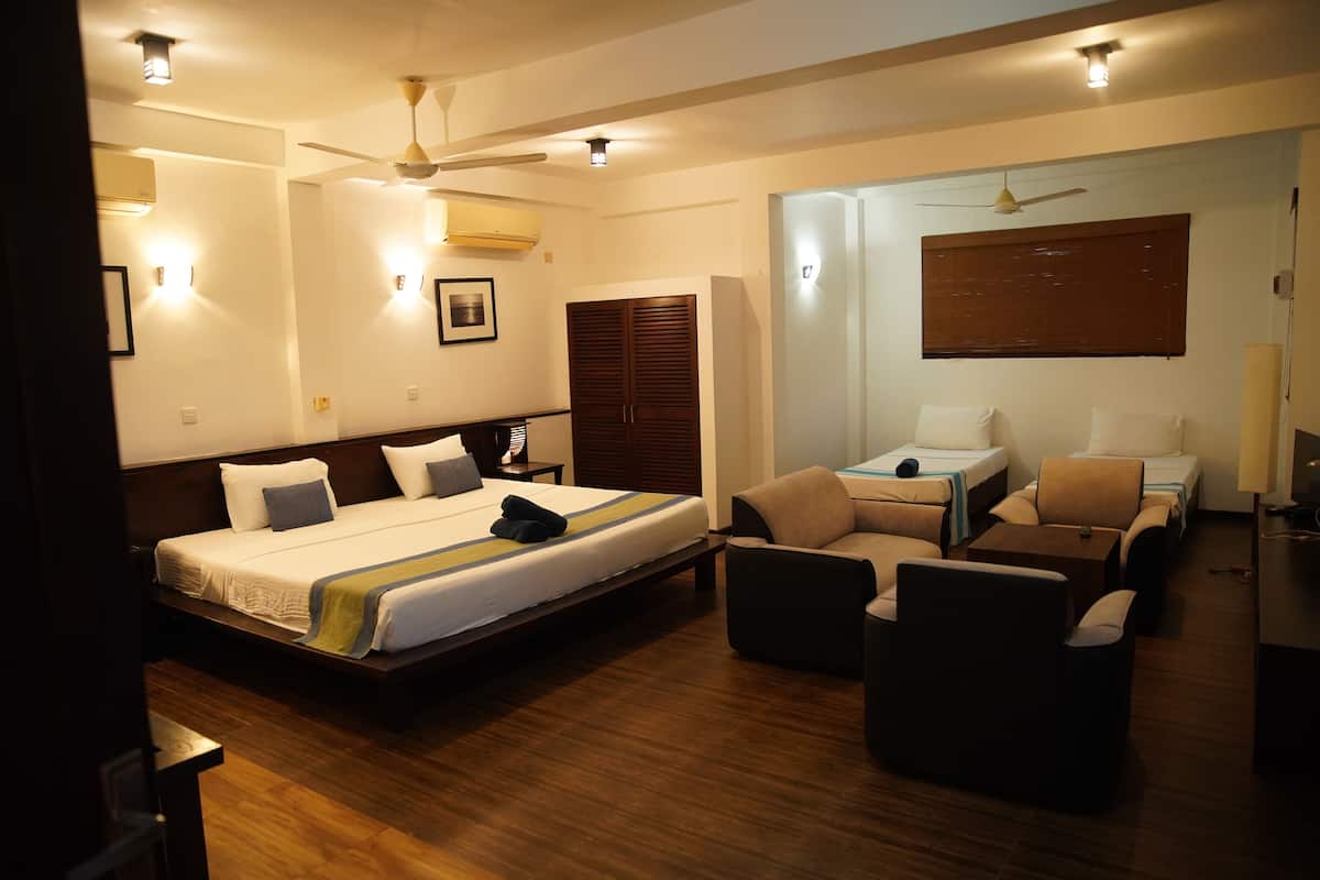 Family Apartment, 1 King Bed, Balcony, Pool View | 1 bedroom, minibar, in-room safe, iron/ironing board