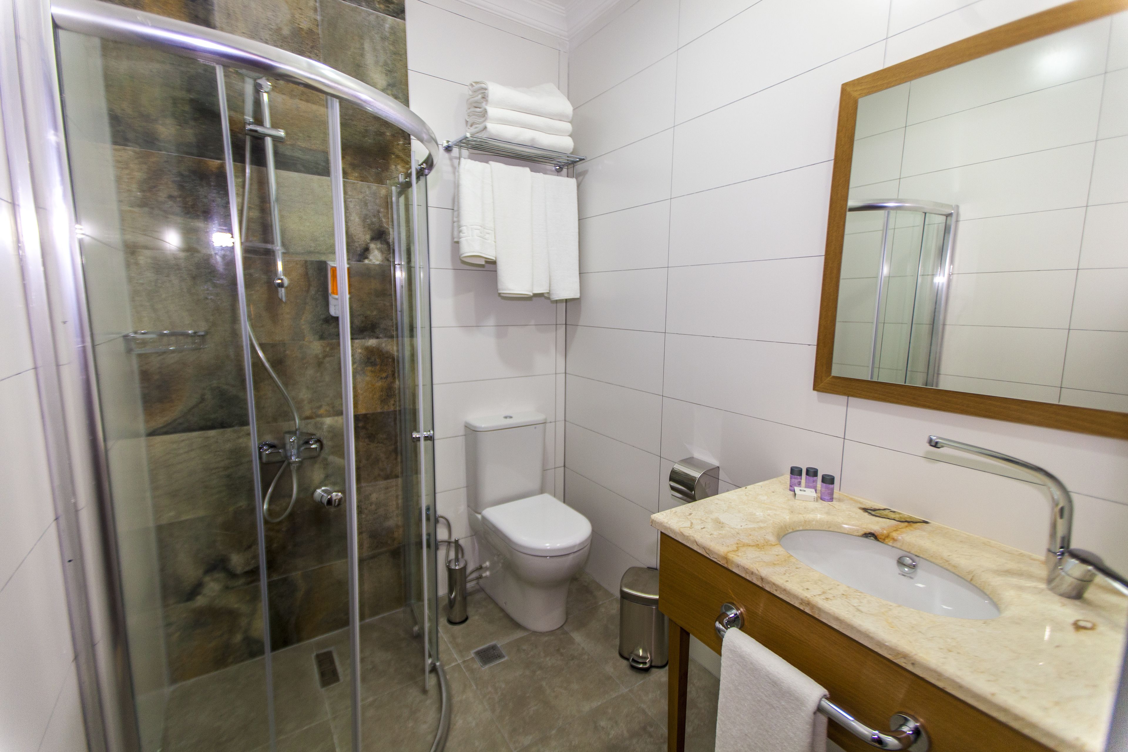 classic triple room | bathroom | shower, free toiletries, hair dryer, bathrobes