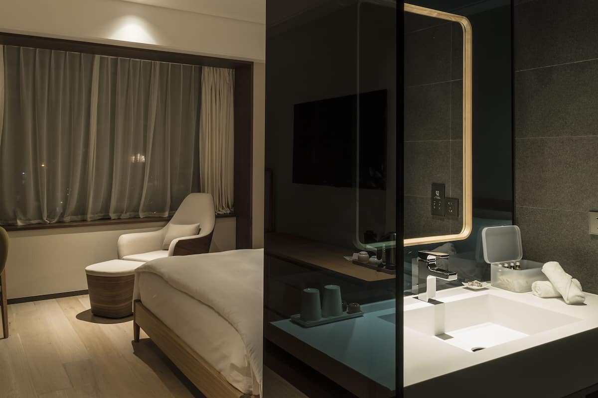 king-sized room ( uv disinfected) | bathroom | designer toiletries, hair dryer, dressing gowns, slippers