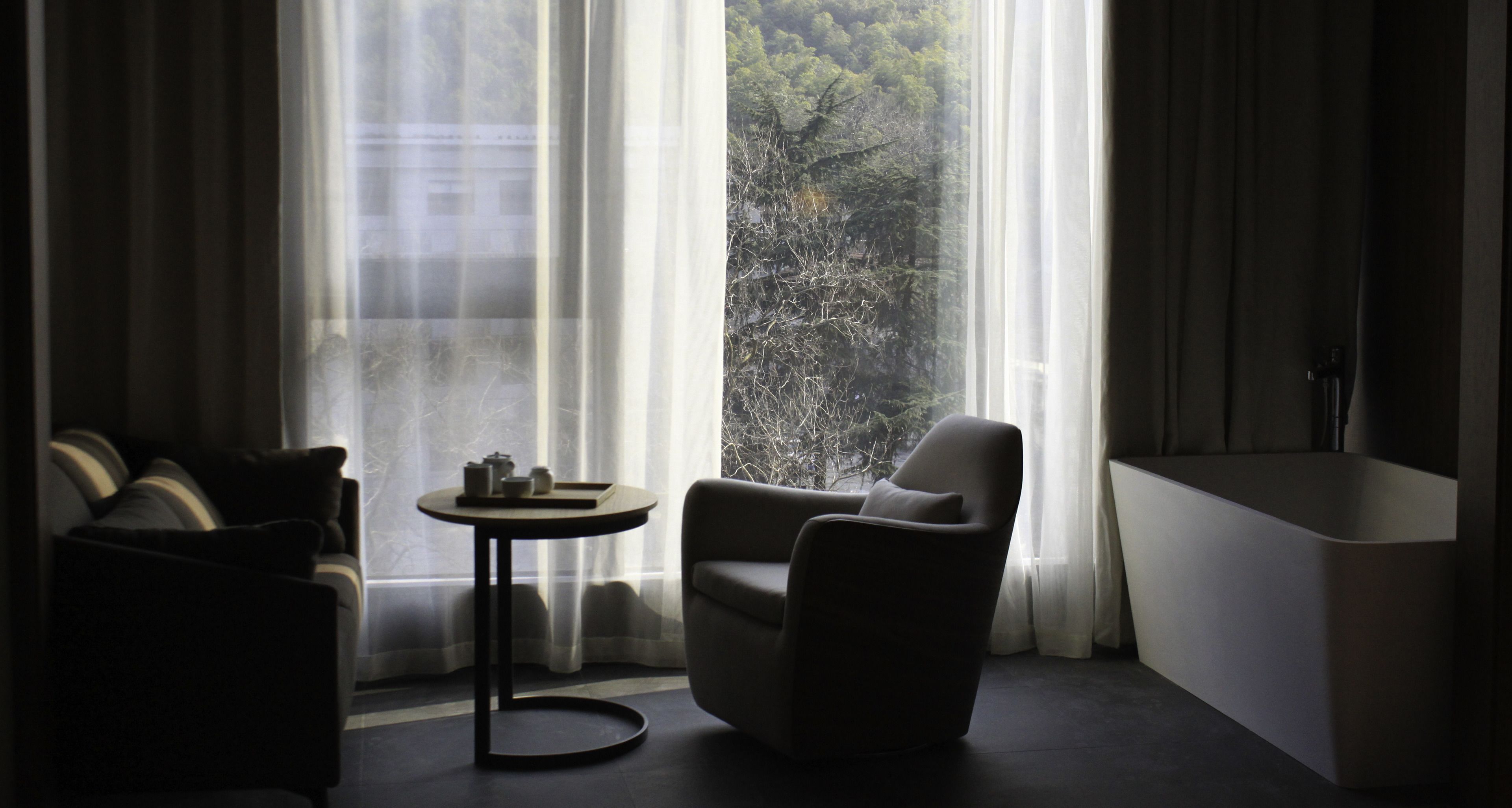 executive room with mountain view (includes air purifier and uv disinfected ) | living area | tv, ipod dock