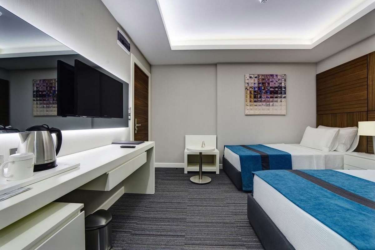 Ropa de cama de alta calidad y minibar 