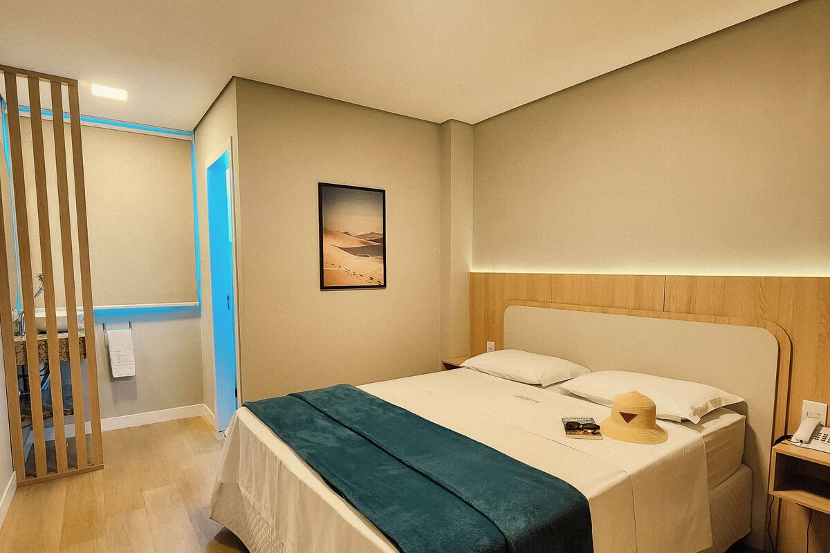Grand tweepersoonskamer | Een minibar, gratis wifi, beddengoed