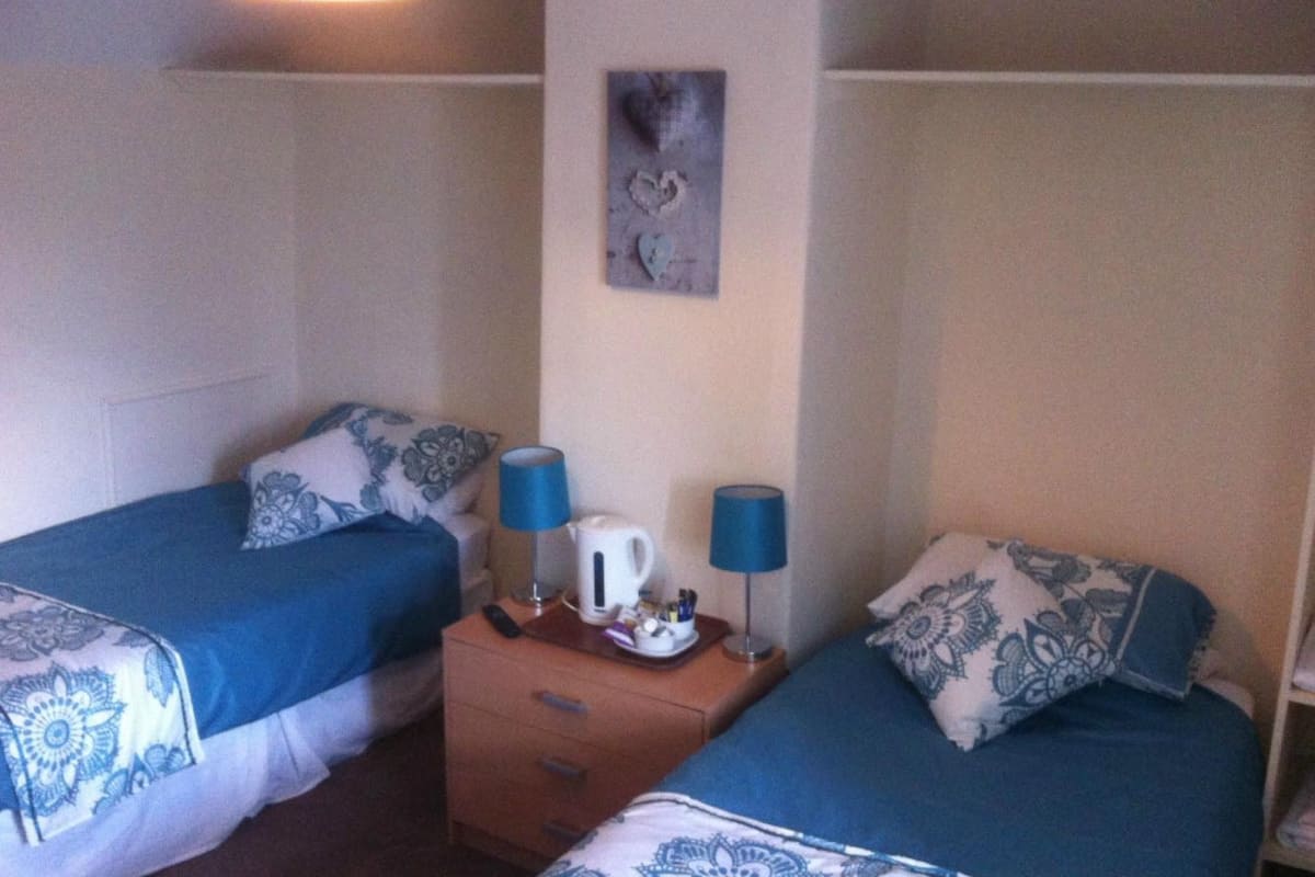 Desk, iron/ironing board, free cribs/infant beds, rollaway beds