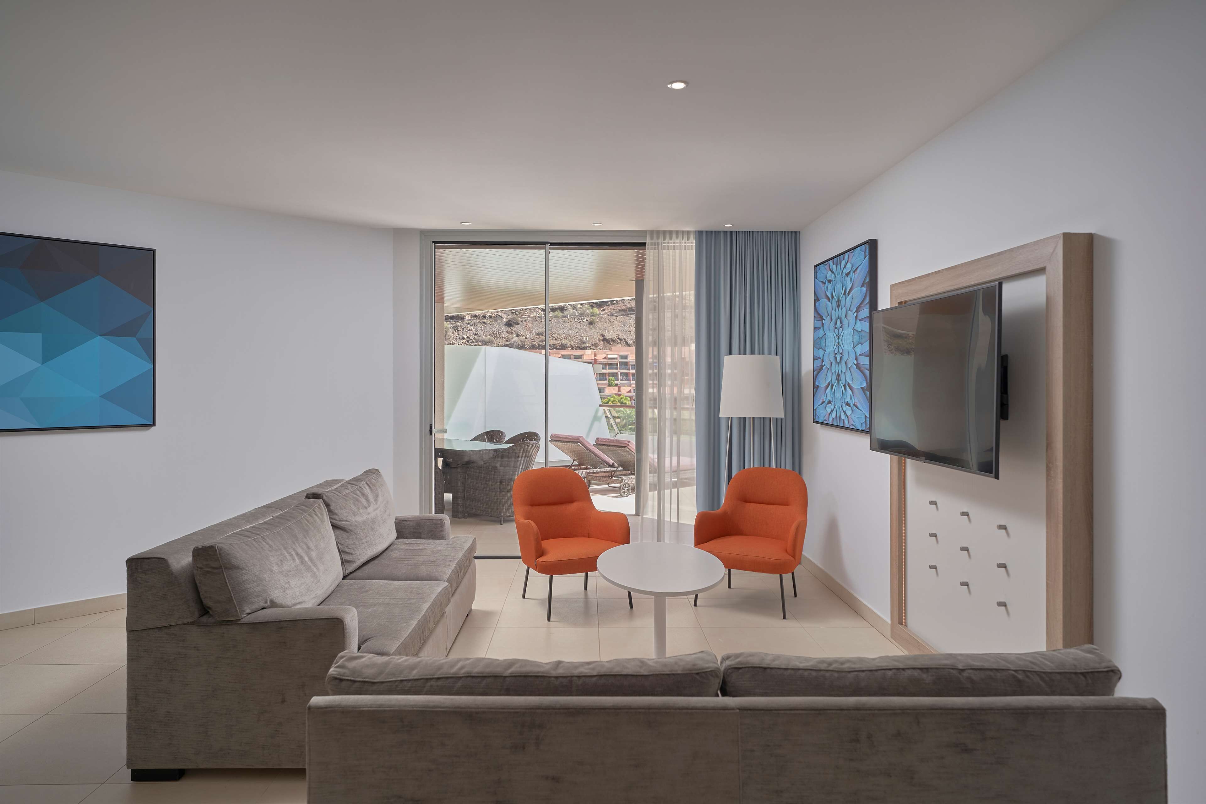 suite, 3 bedrooms, balcony, pool view | living room | led tv