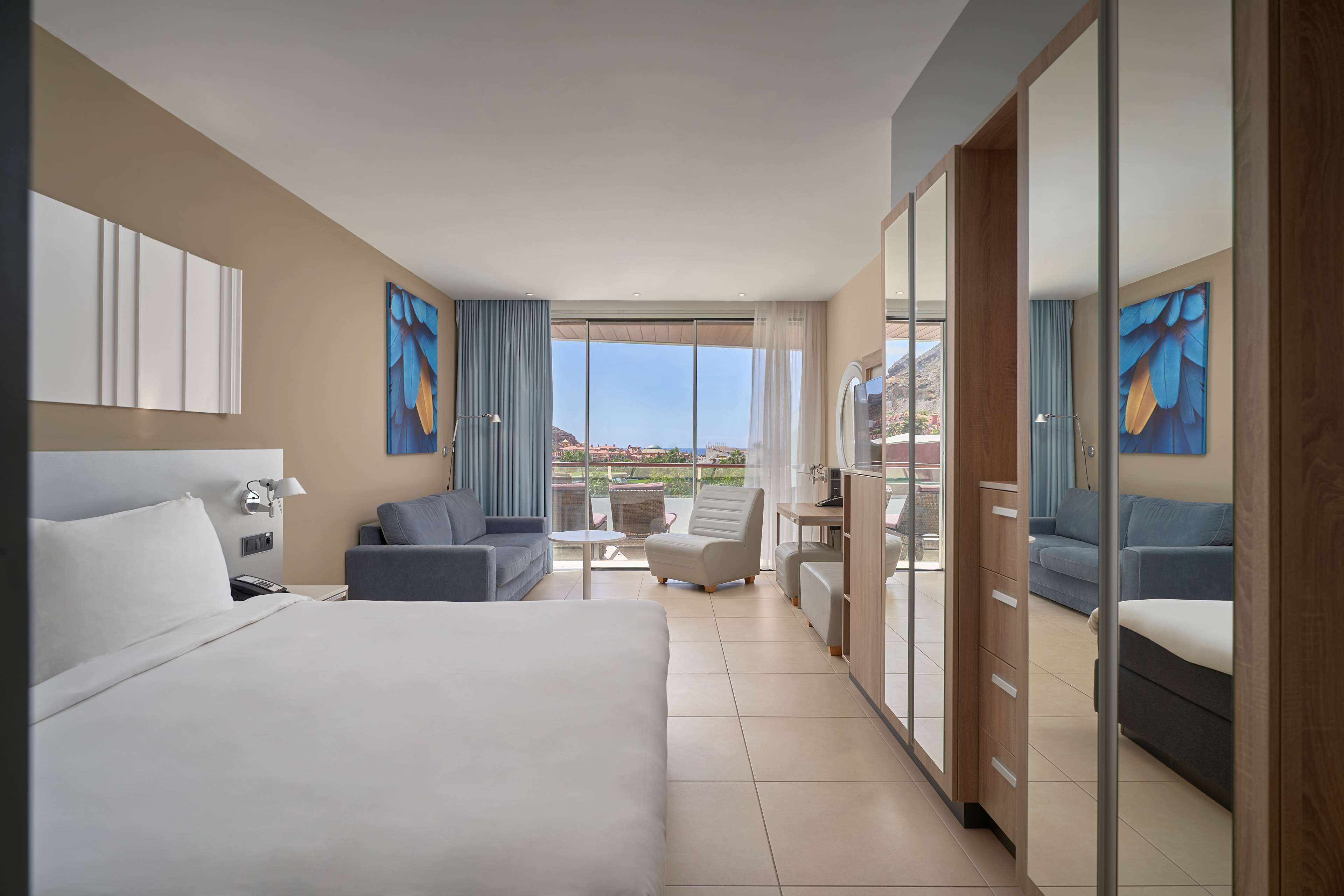 family room, balcony | 1 bedroom, premium bedding, minibar, in-room safe