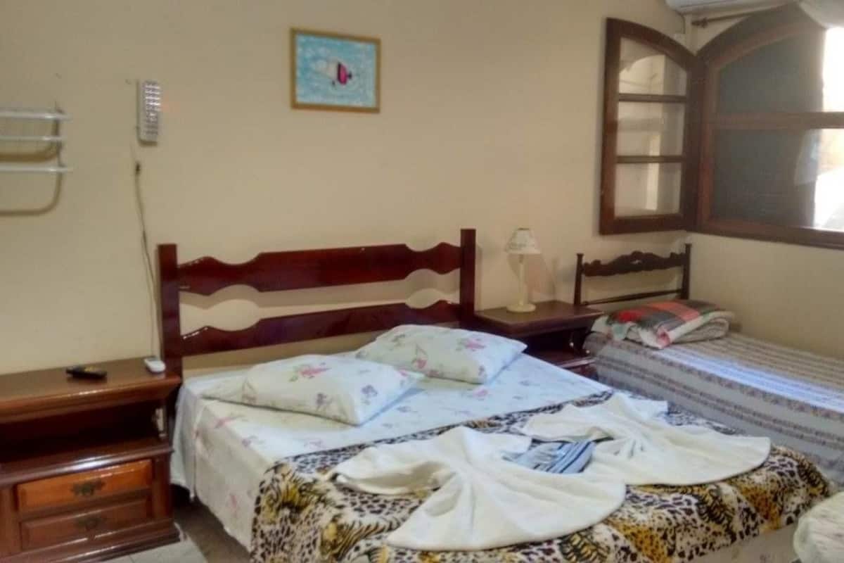 Family Room | Desk, blackout drapes, iron/ironing board, free WiFi