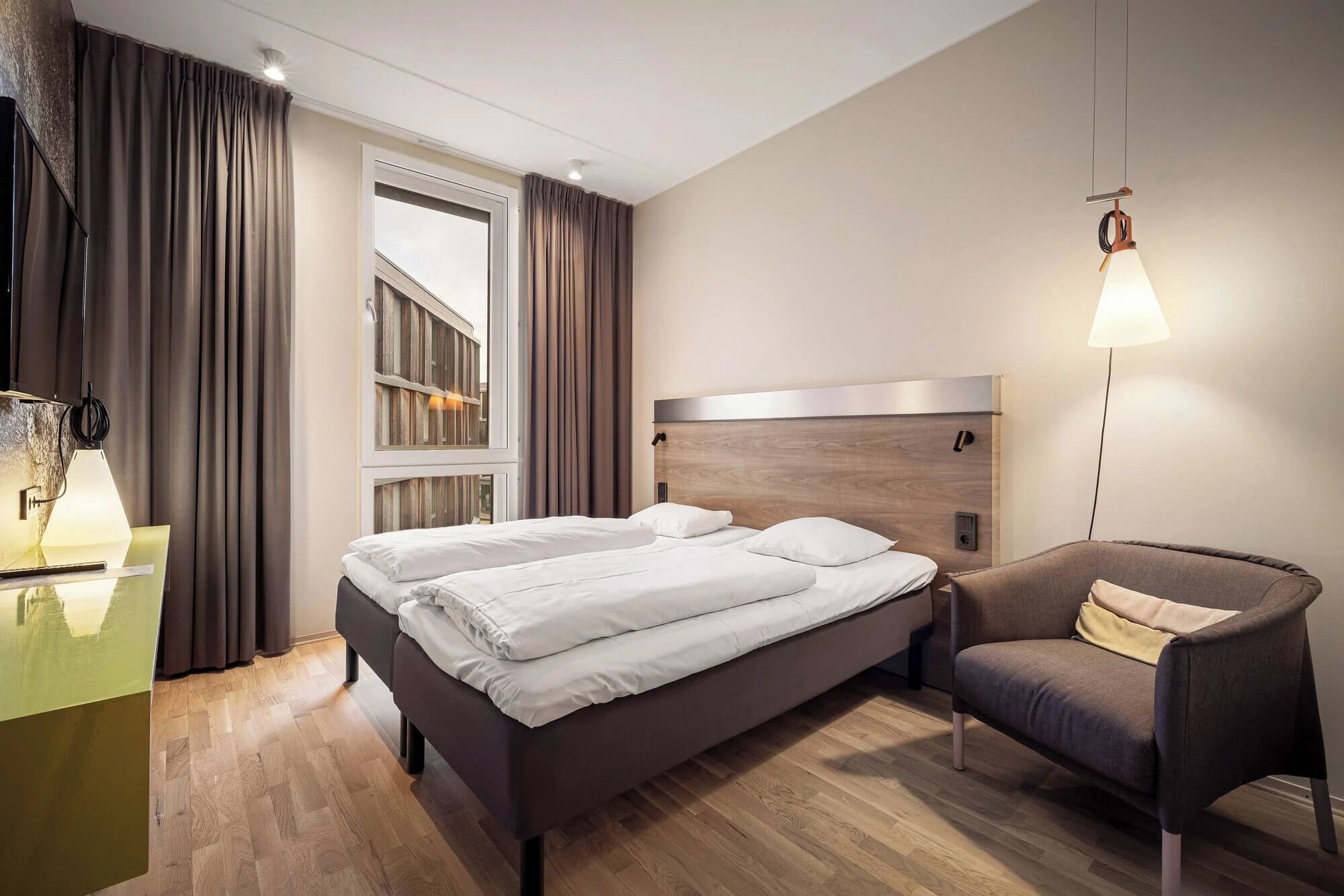 Desk, blackout curtains, soundproofing, bed sheets