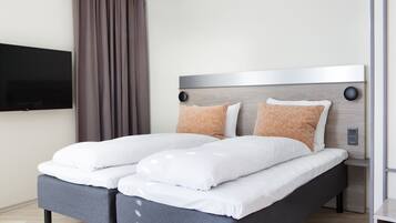 Standard Room, Multiple Beds, Non Smoking (2 Single and 2 Person Sofa Bed) | Desk, blackout curtains, soundproofing, bed sheets