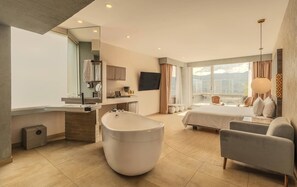 Suite, 1 King Bed (Upper Floor) | Bathroom | Shower, rainfall showerhead, free toiletries, hair dryer - V Grand Hotel, a member of Radisson Individuals (Medellín)