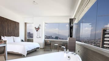 Suite, 1 King Bed, City View | Premium bedding, in-room safe, individually decorated, soundproofing