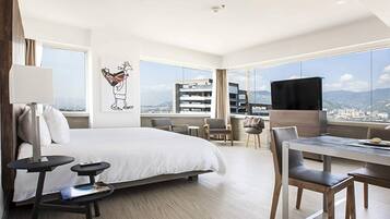 Suite, 1 King Bed, City View | Premium bedding, in-room safe, individually decorated, soundproofing