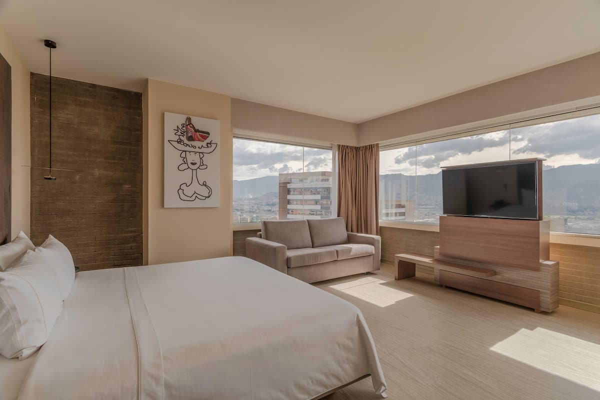 Suite, 1 très grand lit, vue ville | Literie de qualité supérieure, coffres-forts dans les chambres