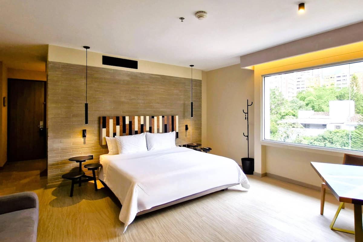 Room, 1 King Bed with Sofa bed | Premium bedding, in-room safe, individually decorated, soundproofing