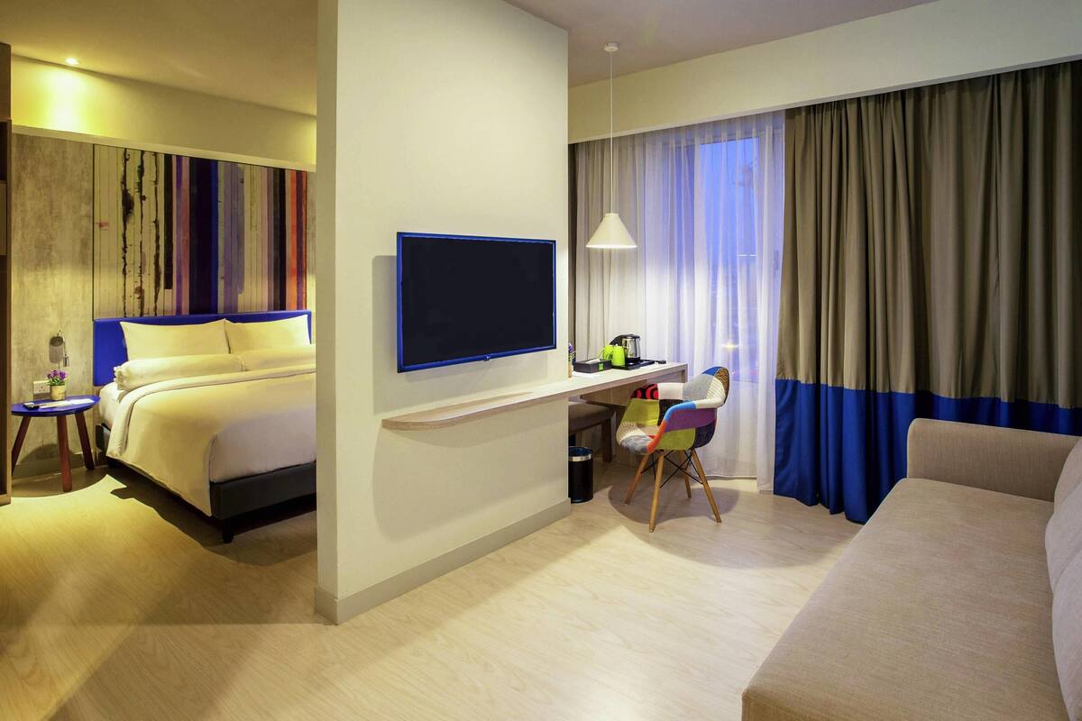 Suíte família, 1 cama de casal e sofá-cama | Frigobar, cofres nos quartos, escrivaninha