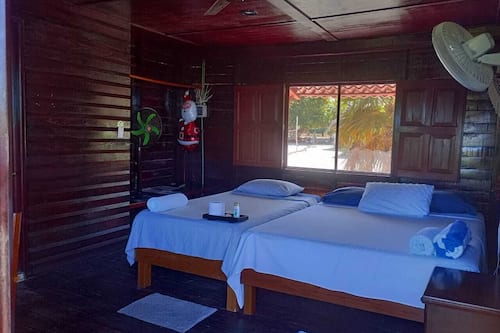 Traditional Cabin, 2 Double Beds, Garden View, Garden Area | Free WiFi, bed sheets