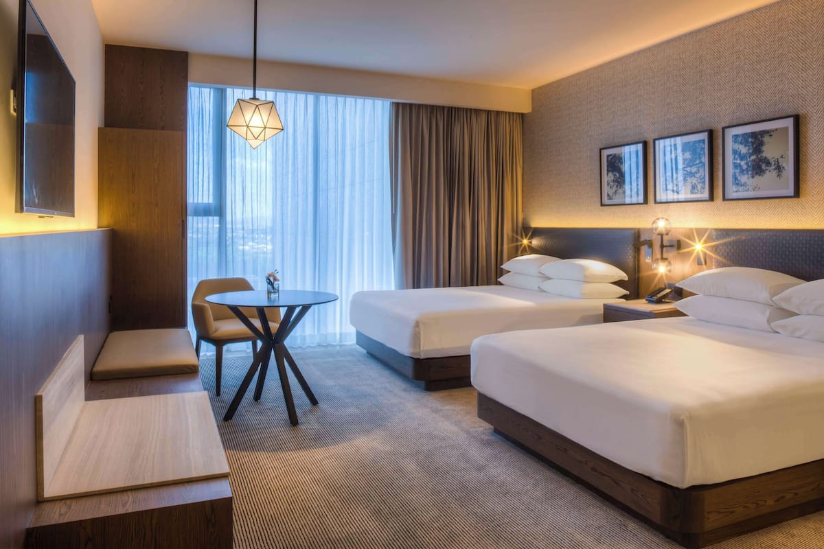 Room, 2 Queen Beds | Minibar, in-room safe, desk, blackout drapes