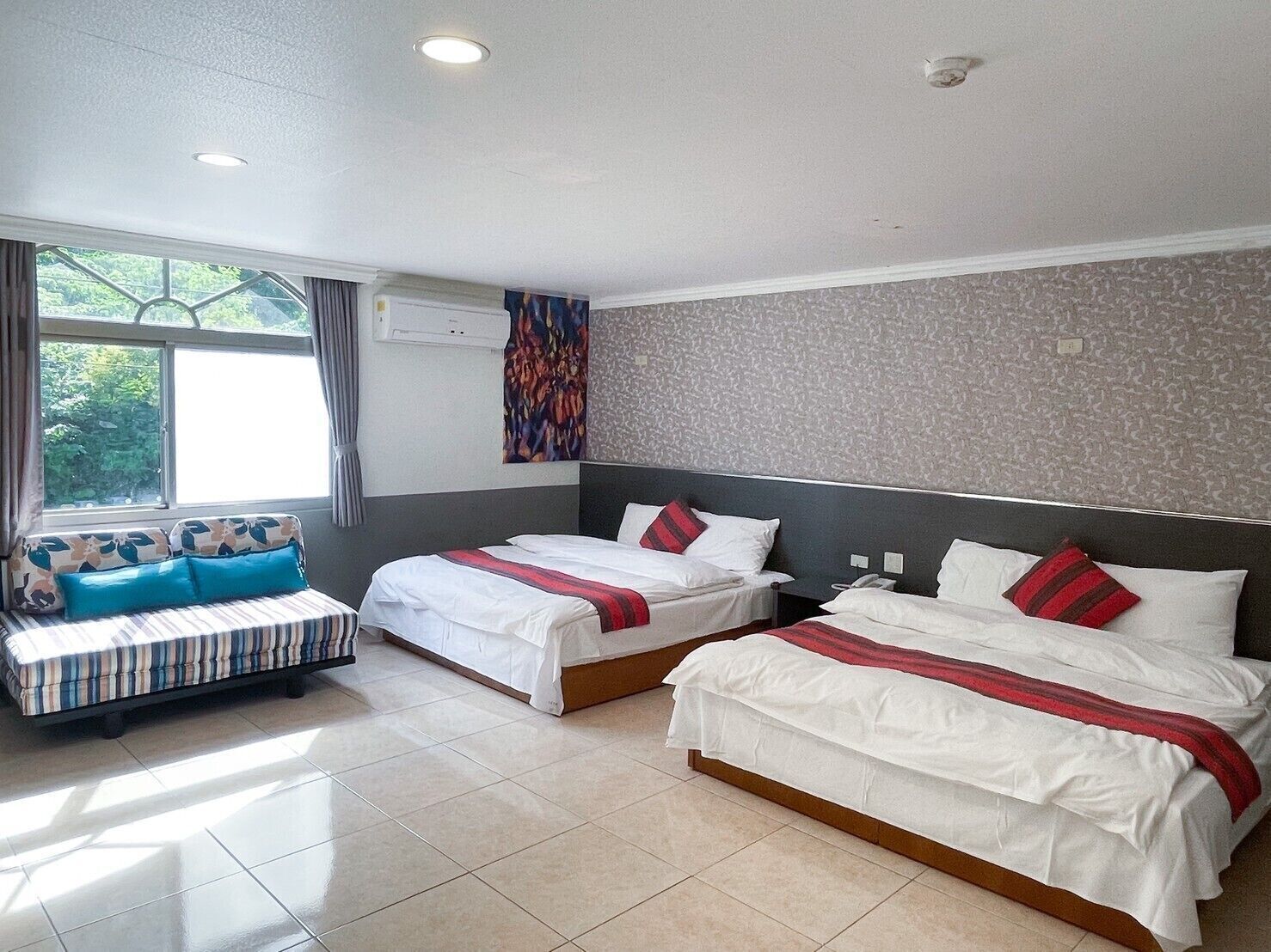 Egyptian cotton sheets, down comforters, desk, blackout drapes