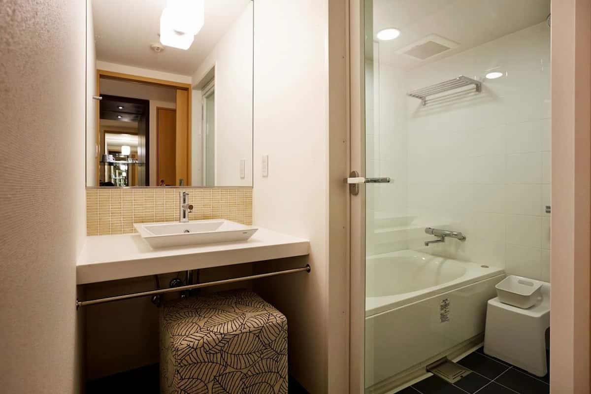 shower, free toiletries, hair dryer, slippers