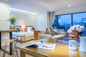 Executive Studio, Balcony, City View | Minibar, in-room safe, desk, soundproofing