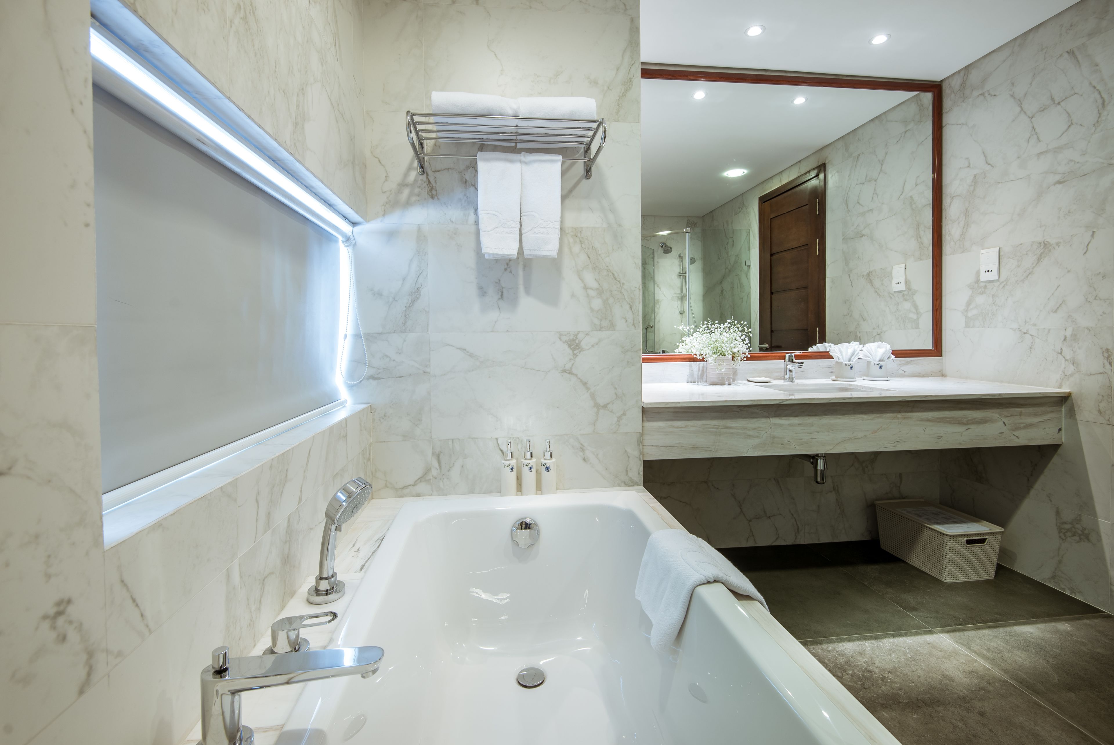 separate bathtub and shower, free toiletries, hair dryer, slippers