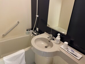 A bathroom with a sink, mirror, and hand soap dispenser. - Quad Inn Yokote (Yokote)