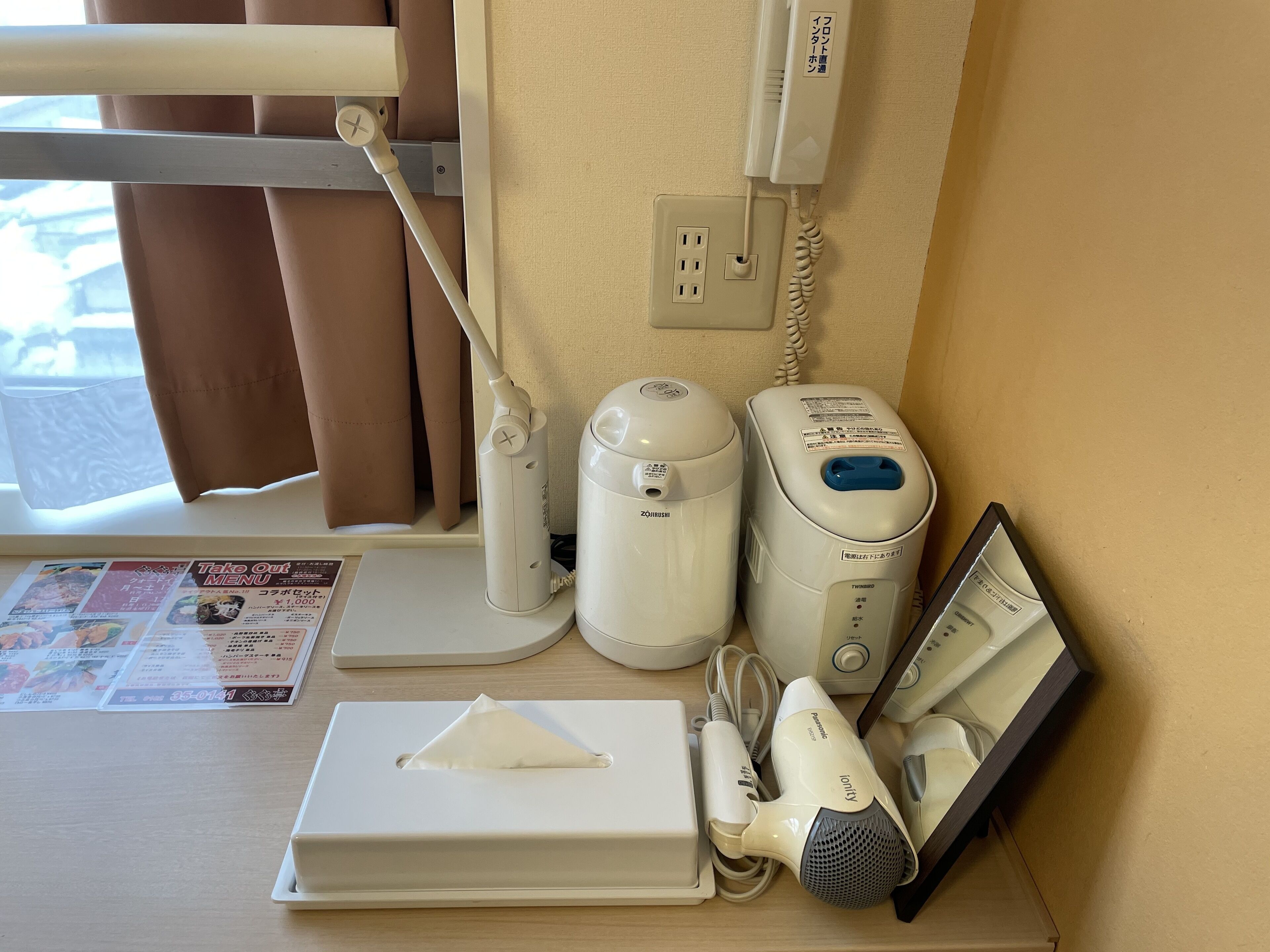 desk, laptop workspace, blackout curtains, iron/ironing board