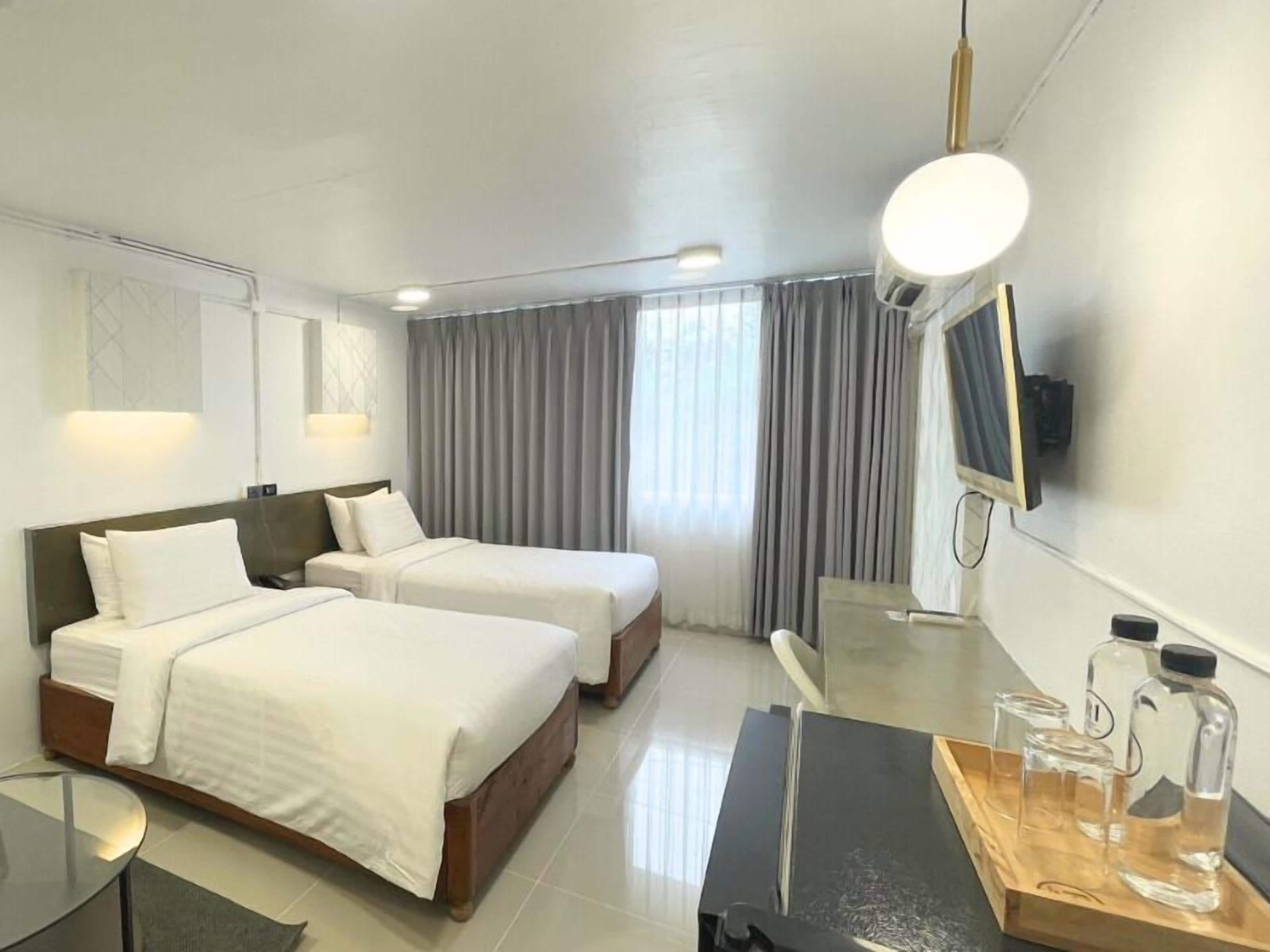 Standard Twin Room | Bureau, rideaux occultants, fer et planche à repasser, Wi-Fi gratuit