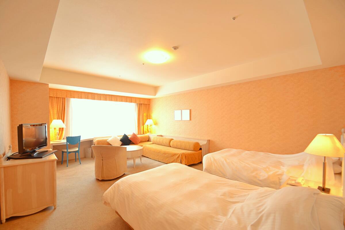 Desk, blackout curtains, iron/ironing board, bed sheets